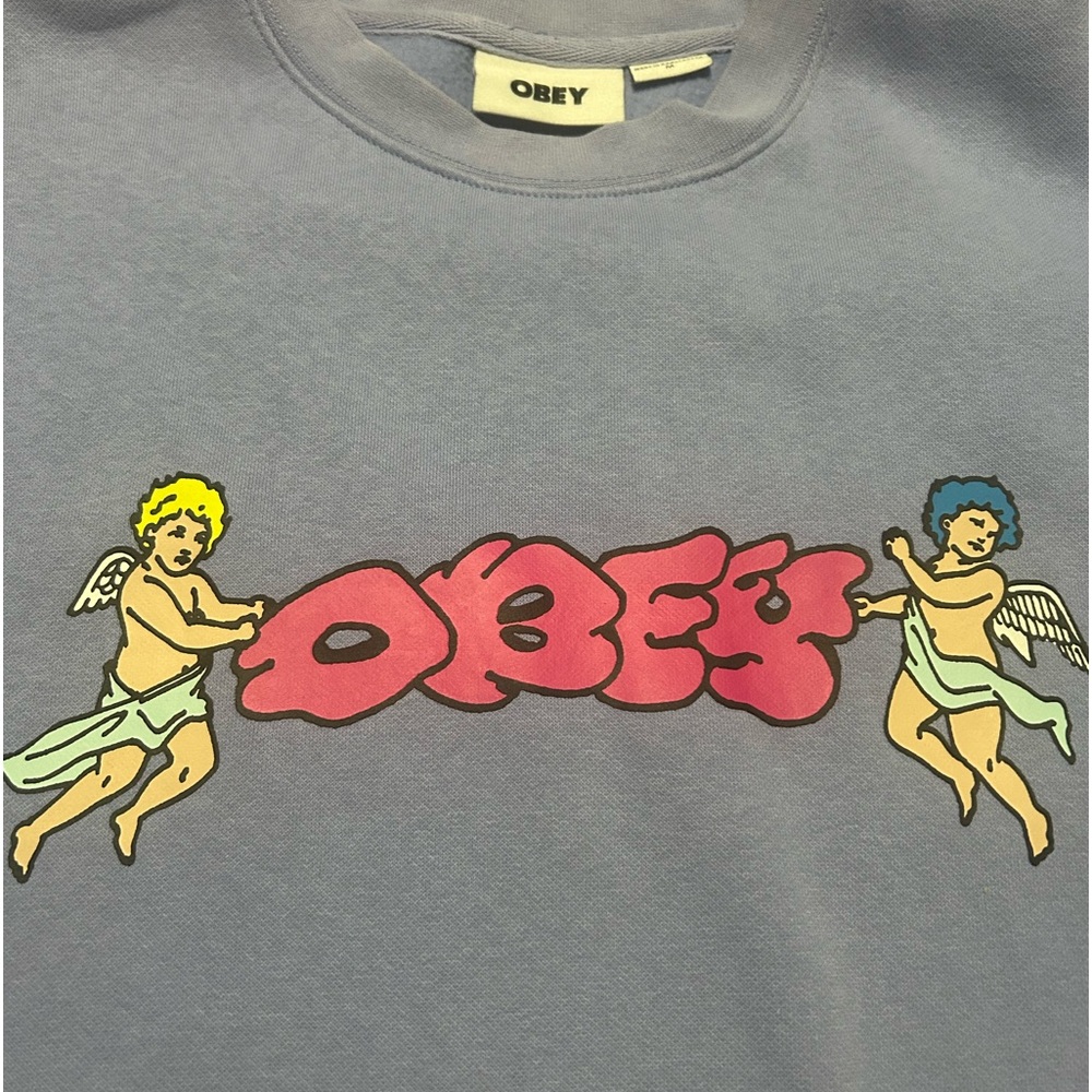Light blue OBEY crewneck sweatshirt size medium